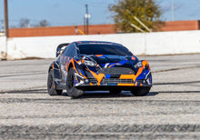 Load image into Gallery viewer, 1/10 Fiesta ST Rally 3s VXL Brushless: AWD Rally Car Orange
