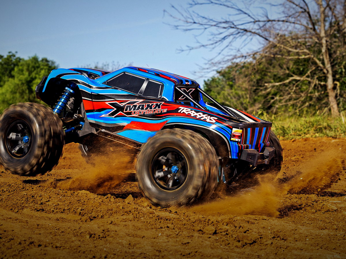 Traxxas Maxx monster truck kicking up dirt